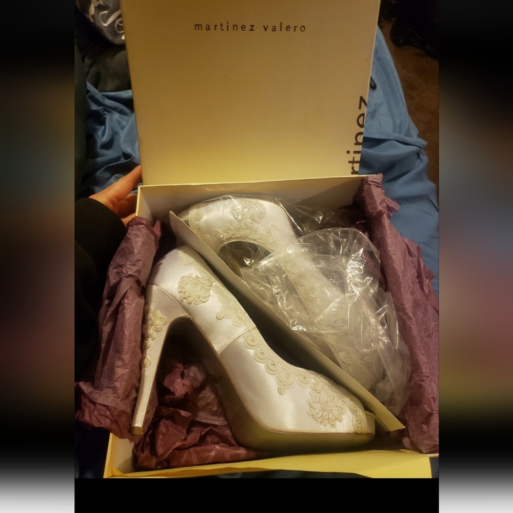 Martinez valero white satin wedding heels size 8.5. Leather sole. Lightly used.